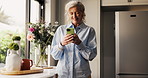 Smile, mature woman and phone at house for research, social media and online news in kitchen. Happy, female person and mobile for browsing website, funny video and notification update of text message