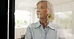 Thinking, senior and woman with smile by window, morning reflection and remember happy memory. Peaceful, contemplation and elderly person in home with daydreaming, relax and nostalgia on weekend.