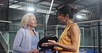 Fitness, women and conversation on court for padel tournament, game or sportsmanship. Athletes, mature people and team with discussion at health club for friendly match, competition or challenge