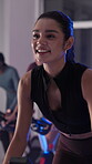 Happy, athlete and woman with bike, spin class and training with machine for wellness and challenge. Cycling, routine and equipment for cardio, healthy and person with endurance for fitness goals