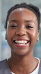 Face, nurse and woman with smile, hospital and confident for healthcare services, help and wellness. Happy, medical professional and black person with scrubs in clinic, pride and career development