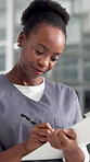 Clipboard, doctor and black woman with smile, writing and wellness with healthcare. African person, happy and professional in hospital, prescription or results for surgery report, notes or schedule