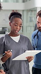 Woman, surgeon and clipboard with team at hospital, discussion and meeting for healthcare report. Person, doctors and medical staff in group with checklist, documents and talk with feedback at clinic