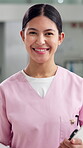 Face, nurse and woman with pride, hospital and happy for healthcare, specialist and medical services. Confident, employee and person with scrubs for health, wellness and career development in clinic