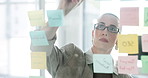 Sticky notes, planning and business woman by glass for creative process, story ideas and editing. Publishing, magazine agency and person writing for schedule, agenda and article research for project