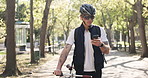Phone, bicycle and delivery man walk outdoor for location, navigation or direction for logistics app. Mobile, courier and cyclist with bike, ecommerce service or search for travel destination at park