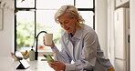 Phone, happy and old woman in kitchen with coffee, internet comedy and laughing at text message. Smile, senior and female person in home with technology, morning drink or funny video on social media.