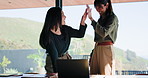 Office, employees and women with laptop, high five and excited for real estate listing and teamwork. Realtor, collaboration and people with tech for property sale, good news and happy with success
