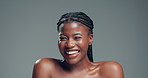 Skincare, smile and face of black woman in studio with health, beauty and facial glow. Laugh, wellness and portrait of African female person with dermatology for cosmetics by gray background.