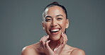 Skincare, laugh and hands with face of woman in studio for beauty, self care and collagen glow. Dermatology, mockup space and shine with female person on background for clear skin and hydration
