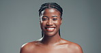 Skincare, smile and face of black woman in studio with health, beauty and facial glow. Happy, wellness and portrait of African female person with dermatology for cosmetics by gray background.