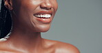 Dental, happy and teeth of woman in studio with whitening treatment, implant results or mockup space. Cosmetics, mouth of person and smile on gray background for oral hygiene, veneers and confidence