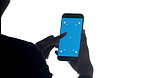 Hand, phone and click green screen in studio with mock up space for user experience on white background. Person, smartphone and display with empty ui, scroll and test with mobile app development