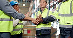 Happy people, logistics and handshake with applause in warehouse for supply chain success or deal. Excited, group or employees shaking hands with team for distribution, partnership or agreement