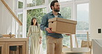 Couple, walking and door with box at new house for moving in, mortgage success and investment. People, package and relocation for home purchase, real estate loan and explore living room of property
