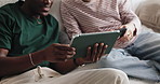 Hands, friends and happy with tablet on sofa, talk and share post on web, relax and movie choice in home. People, tech and show notification for video, streaming or social media on couch at apartment