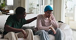 Talking, help and men on sofa for support, empathy and comforting for relationship problem. Living room, home and friends in conversation, discussion and consoling for mistake, cheating or breakup