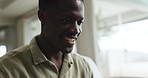 Black man, laptop and happy on sofa with remote work from home, review and project management in living room. Person, freelance writer and computer with reflection, decision or editing at apartment