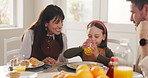 Breakfast, juice and parents with child in home for eating healthy meal, nutrition and wellness. Family, happy and morning with mom, dad and girl with food for bonding, relationship and drinking