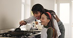 Cooking, pancakes and mom with girl in kitchen for learning, bonding and help with breakfast. Family, morning and mother with child by stove to prepare brunch for wellness, health and love in home