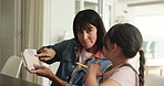 Homework, alphabet cards and mom with child in home for language lesson, learning and teaching. Family, helping and mother with girl with letters for education, studying and development in house