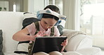 Home, online and child with tablet, headphones and listening to lesson on social media or elearning. Education, growth and development of girl with tech for knowledge, browsing and studying with app
