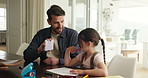 Homework, alphabet card and dad with child in home for language lesson, learning and teaching. Family, helping and father with girl with letters for education, studying and development in house