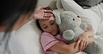 Mother, support and sick child with teddy bear in bed, monitor fever and illness symptoms of daughter. Comfort, touch forehead and woman care for girl in home, virus infection and check temperature.