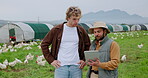 Conversation, planning and tablet with men on farm together for agriculture, poultry or sustainability. App, chicken and development with farmer people in countryside for checklist or inspection