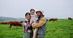 Portrait, parents and child on farm with support, agriculture and bonding together with cattle. Happy, relax and family in countryside with cows, sustainability or fresh air for childhood development