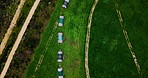 Aerial view, chicken coop and landscape of farm for agriculture, production and livestock industry. Drone, free range poultry and organic animals with hen house at natural pasture with grass outdoor
