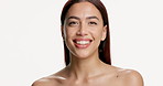 Face, skincare and smile with woman in studio for cosmetology, skin wellness and laughing. Portrait, funny and happy model with beauty, natural cosmetics and aesthetic glow on white background