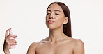 Face mist, skincare and face of woman in studio with cosmetic, beauty and facial treatment. Happy, hydration and portrait of person with setting spray for dermatology routine by white background.