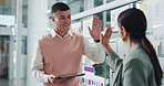 Business people, web designer and tablet with high five on glass board for UI development. Happy man, woman or colleagues with smile or technology for online UX or digital success together in office