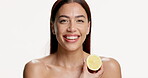 Smile, lemon and skincare with face of woman in studio for vitamin c, beauty and self care. Organic cosmetics, dermatology and glow with person and fruit on white background for shine and detox