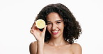 Happy woman, face and lemon with skincare in studio for vitamin C on a white background. Portrait, female person or model with smile or natural organic citrus fruit for health, detox or antioxidant