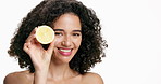 Happy woman, face or skincare with lemon or space for vitamin C on a white studio background. Portrait, female person or model with smile for natural organic citrus fruit for antioxidant or detox