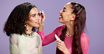 Friends, women and apply mascara in studio for beauty routine, glamour makeover and bonding. Makeup, gen z girls or eyelash product on purple background for transformation and getting ready for event