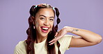 Woman, smile pose or face in studio with confidence, playful or laughing for positive energy. Gen z, student and gesture on mockup space with purple background, happy and portrait for social media