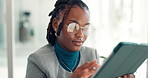 Black woman, tablet and scroll in office at startup for insight, notes or checklist for project at media company. Person, smartphone and tech with app, review proposal and research at creative agency