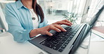 Creative, hands and business woman on laptop for research, news story and article review. Publishing, digital magazine and person on computer for typing feedback, online report and website in office