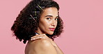 Makeup, glow and face of woman in studio with self care, hairstyle or facial beauty by mockup space. Cosmetics, confident and portrait of female person from Brazil with cosmetology by pink background
