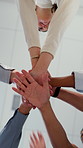 Hands, stack and low angle with team at office with motivation, celebration and goals at company. Business people, circle and pile with palm, support or achievement with success for project at agency