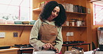 House, pestle and woman in kitchen, chef and cooking with ingredients, herbs and recipe. Apartment, culinary skills professional and person with cuisine, spice and food with utensils and grinder