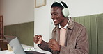 Black man, laptop and fist pump for video call at cafe with good news, positive feedback and deal. Male person, headphones and applause for webinar, celebration and promotion winner at coffee shop