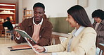 Cooperation, documents and business people in cafe, conversation and meeting with brainstorming. Employees, man and woman in coffee shop, computer and report for sales growth, discussion and teamwork