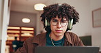 Headphone, education and man with laptop in coffee shop, streaming music and reading for scholarship. Audio tech, thinking and university student with pc for research, studying and learning in cafe.