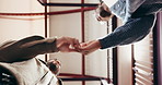 Talking, friends and men with secret handshake, bonding or reunion with friendly gesture or greeting. Low angle, people and shaking hands on weekend, conversation and agreement on break and hangout