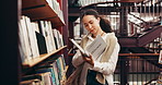 Books, university and woman in library for education, learning or research with knowledge. Studying, project and female student with academic information for college exam or assignment on campus.