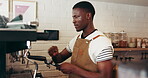 African man, machine or grind preparation in cafe with espresso, professional or order for hospitality service. Barista, latte or person in coffee shop with equipment, skill or beverage for business.